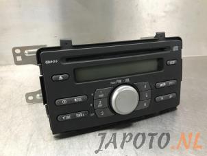 Usagé Radio/Lecteur CD Daihatsu Cuore (L251/271/276) 1.0 12V DVVT Prix € 74,95 Règlement à la marge proposé par Japoto Parts B.V.