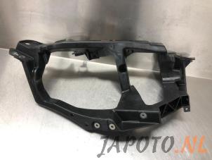 Used Headlight frame, right Mitsubishi Colt (Z2/Z3) 1.5 16V CZ3 Price € 24,14 Inclusive VAT offered by Japoto Parts B.V.