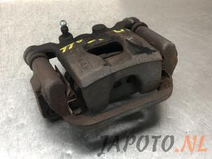 Used Rear brake calliper, left Nissan Juke (F15) 1.2 DIG-T 16V Price € 39,99 Margin scheme offered by Japoto Parts B.V.