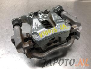 Used Rear brake calliper, left Toyota Yaris IV (P21/PA1/PH1) 1.5 12V Hybrid Price € 149,00 Margin scheme offered by Japoto Parts B.V.