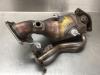 Exhaust manifold + catalyst from a Toyota Yaris IV (P21/PA1/PH1) 1.5 12V Hybrid 2022
