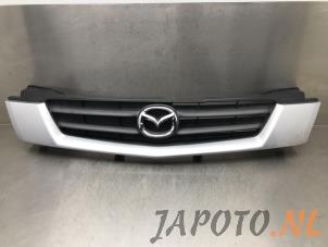 Used Grille Mazda Demio (DW) 1.5 16V Price € 49,95 Margin scheme offered by Japoto Parts B.V.