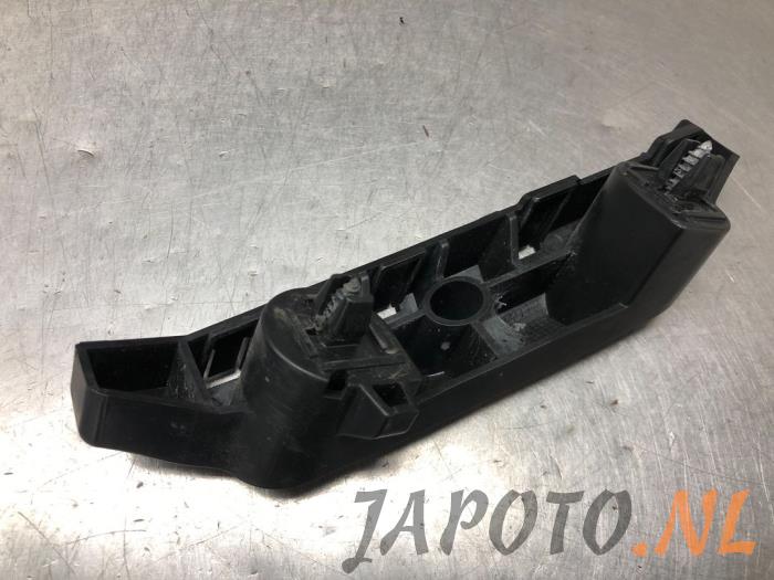 Front bumper bracket, left from a Nissan Note (E12) 1.2 68 2015