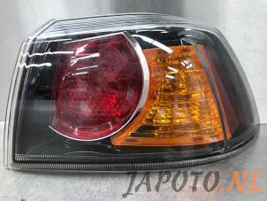 Usagé Feu arrière droit Mitsubishi Lancer Sports Sedan (CY/CZ) 1.8 MIVEC 16V Prix € 79,95 Règlement à la marge proposé par Japoto Parts B.V.