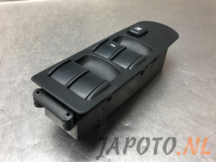 Multi-functional window switch from a Mitsubishi Colt (Z2/Z3) 1.3 16V 2012