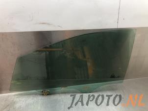 Używane Szyba drzwi lewych przednich wersja 4-drzwiowa Kia Cee'd Sportswagon (JDC5) 1.6 CRDi 16V VGT Cena € 39,95 Procedura marży oferowane przez Japoto Parts B.V.