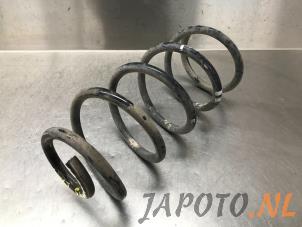 Używane Sprezyna srubowa tyl Nissan Micra (K14) 0.9 IG-T 12V Cena € 24,99 Procedura marży oferowane przez Japoto Parts B.V.