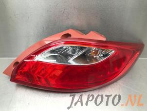 Używane Tylne swiatlo pozycyjne prawe Mazda 2 (DE) 1.3 16V MZR Cena € 49,95 Procedura marży oferowane przez Japoto Parts B.V.