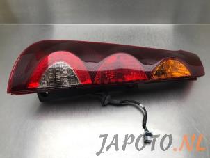 Used Taillight, left Nissan Note (E11) 1.4 16V Price € 49,95 Margin scheme offered by Japoto Parts B.V.