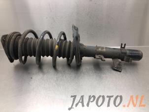 Used Front shock absorber rod, left Nissan Qashqai (J11) 1.2 DIG-T 16V Price € 100,00 Margin scheme offered by Japoto Parts B.V.