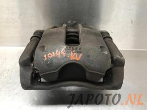 Used Front brake calliper, right Nissan Note (E11) 1.4 16V Price € 24,99 Margin scheme offered by Japoto Parts B.V.