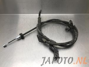Used Parking brake cable Kia Cee'd Sportswagon (JDC5) 1.6 CRDi 16V VGT Price € 14,95 Margin scheme offered by Japoto Parts B.V.