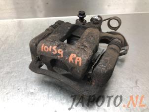 Used Rear brake calliper, right Kia Rio III (UB) 1.2 CVVT 16V Price € 49,95 Margin scheme offered by Japoto Parts B.V.