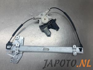Używane Mechanizm szyby lewej przedniej wersja 2-drzwiowa Kia Rio III (UB) 1.2 CVVT 16V Cena € 45,00 Procedura marży oferowane przez Japoto Parts B.V.