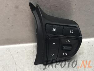Used Steering wheel switch Kia Rio III (UB) 1.2 CVVT 16V Price € 34,95 Margin scheme offered by Japoto Parts B.V.