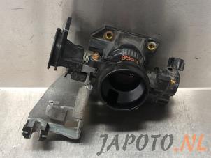Used Throttle body Daihatsu Cuore (L251/271/276) 1.0 12V DVVT Price € 34,95 Margin scheme offered by Japoto Parts B.V.