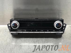 Usados Panel de control de calefacción Mitsubishi Outlander (GF/GG) 2.4 16V PHEV 4x4 Precio € 99,98 Norma de margen ofrecido por Japoto Parts B.V.