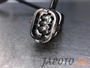 Klopfsensor van een Kia Rio III (UB) 1.2 CVVT 16V 2012