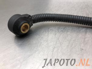Klopfsensor van een Kia Rio III (UB) 1.2 CVVT 16V 2012
