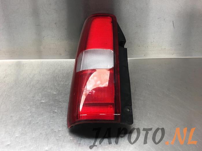 Taillight, left from a Suzuki Jimny Hardtop 1.3i 16V 4x4 2000