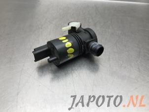 Used Windscreen washer pump Nissan Note (E12) 1.2 68 Price € 19,95 Margin scheme offered by Japoto Parts B.V.