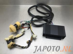 Usados Amplificador de radio Kia Rio III (UB) 1.2 CVVT 16V Precio € 149,00 Norma de margen ofrecido por Japoto Parts B.V.
