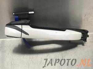 Usagé Poignée de porte arrière droite Subaru Impreza III (GH/GR) 2.0D AWD Prix € 24,95 Règlement à la marge proposé par Japoto Parts B.V.