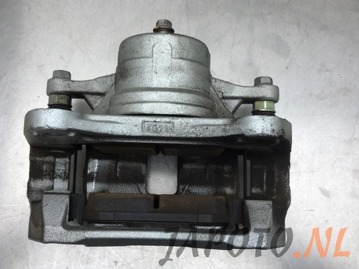 Front brake calliper, left from a Kia Sportage (NQ5) 1.6 T-GDi Hybrid 16V AWD 2023