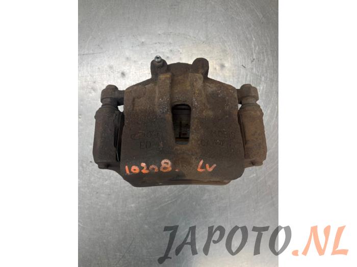 Gebrauchte Bremszange links vorne Kia Pro cee'd (EDB3) 1.4 CVVT 16V Preis € 15,70 Margenregelung angeboten von Japoto Parts B.V.