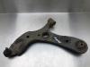 Front lower wishbone, left from a Toyota Avensis Wagon (T27) 1.8 16V VVT-i 2010