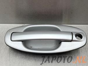 Usagé Poignée de porte avant gauche Hyundai Santa Fe I 2.0 16V 4x2 Prix € 14,95 Règlement à la marge proposé par Japoto Parts B.V.