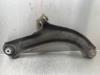 Front lower wishbone, left from a Nissan Note (E11) 1.4 16V 2007