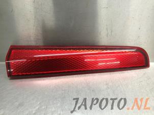 Used Reflector tail light garnish panel Nissan Note (E11) 1.4 16V Price € 19,95 Margin scheme offered by Japoto Parts B.V.