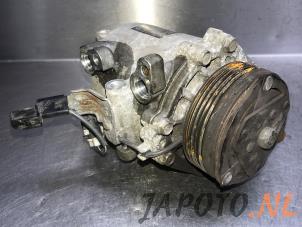 Used Air conditioning pump Mitsubishi Colt (Z2/Z3) 1.1 12V Price € 149,95 Margin scheme offered by Japoto Parts B.V.
