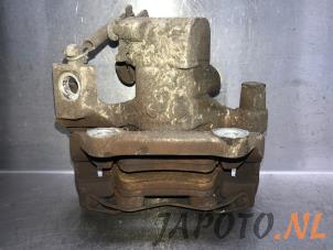 Used Rear brake calliper, left Toyota Yaris III (P13) 1.5 16V Hybrid Price € 39,99 Margin scheme offered by Japoto Parts B.V.