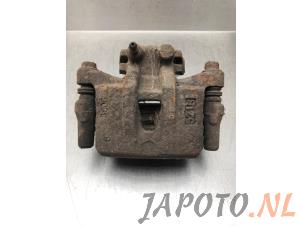 Used Rear brake calliper, left Mitsubishi Grandis (NA) 2.4 16V MIVEC Price € 34,95 Margin scheme offered by Japoto Parts B.V.