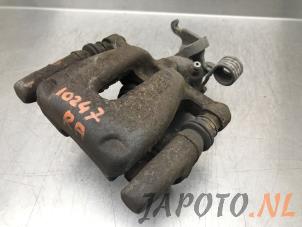 Used Rear brake calliper, right Mitsubishi Colt (Z2/Z3) 1.5 16V Price € 39,95 Margin scheme offered by Japoto Parts B.V.