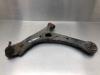 Front lower wishbone, left from a Toyota Corolla Verso (R10/11) 1.6 16V VVT-i 2007