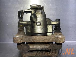 Used Rear brake calliper, left Nissan Primastar 1.9 dCi 80 Price € 34,95 Margin scheme offered by Japoto Parts B.V.