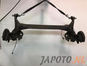 Used Rear-wheel drive axle Mitsubishi Colt (Z2/Z3) 1.5 16V CZT Turbo Price € 99,95 Margin scheme offered by Japoto Parts B.V.