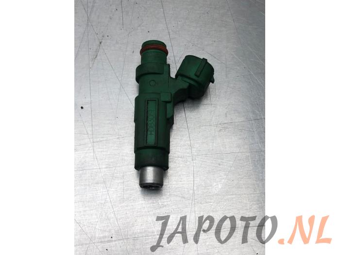 Injector (petrol injection) from a Mitsubishi Colt (Z2/Z3) 1.5 16V CZT Turbo 2005
