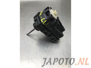 Used Headlight motor Honda Civic (FK6/7/8/9) 1.0i VTEC Turbo 12V Price € 17,50 Margin scheme offered by Japoto Parts B.V.