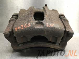 Used Front brake calliper, left Hyundai i20 1.2i 16V Price € 39,95 Margin scheme offered by Japoto Parts B.V.