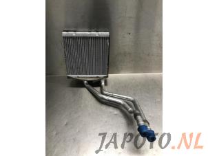 Used Heating radiator Nissan Note (E12) 1.2 68 Price € 39,99 Margin scheme offered by Japoto Parts B.V.