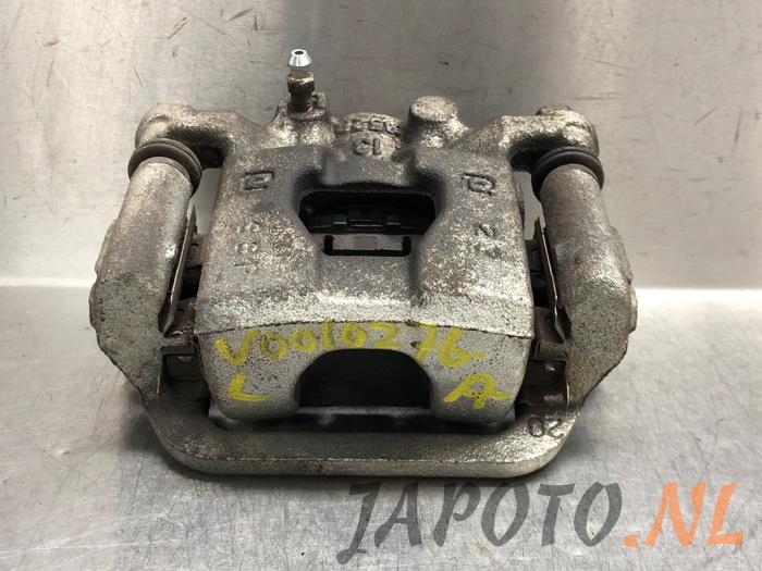 Gebrauchte Bremszange links hinten Nissan NV 200 (M20M) E-NV200 Preis € 26,20 Margenregelung angeboten von Japoto Parts B.V.