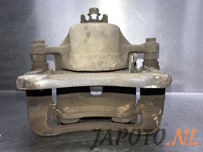 Gebrauchte Bremszange links vorne Kia Rio IV (YB) 1.0i T-GDi 100 12V Preis € 20,95 Margenregelung angeboten von Japoto Parts B.V.