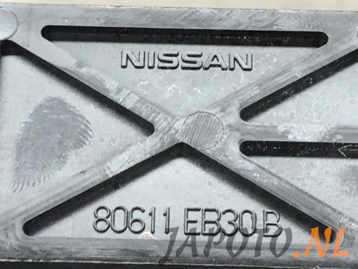 Rear door handle 4-door, left from a Nissan Qashqai (J10) 2.0 16V 2012
