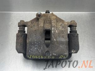 Usagé Etrier de frein (pince) avant droit Kia Sportage (SL) 2.0 CVVT 16V 4x4 Prix € 49,95 Règlement à la marge proposé par Japoto Parts B.V.