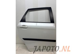 Usagé Porte arrière droite Toyota Verso S 1.33 16V Dual VVT-I Prix € 299,95 Règlement à la marge proposé par Japoto Parts B.V.
