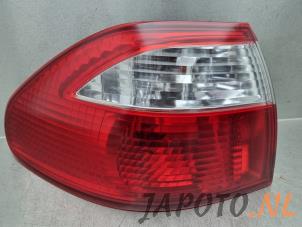 Used Taillight, left Mazda 626 (GF14) 1.8i 16V Price on request offered by Japoto Parts B.V.